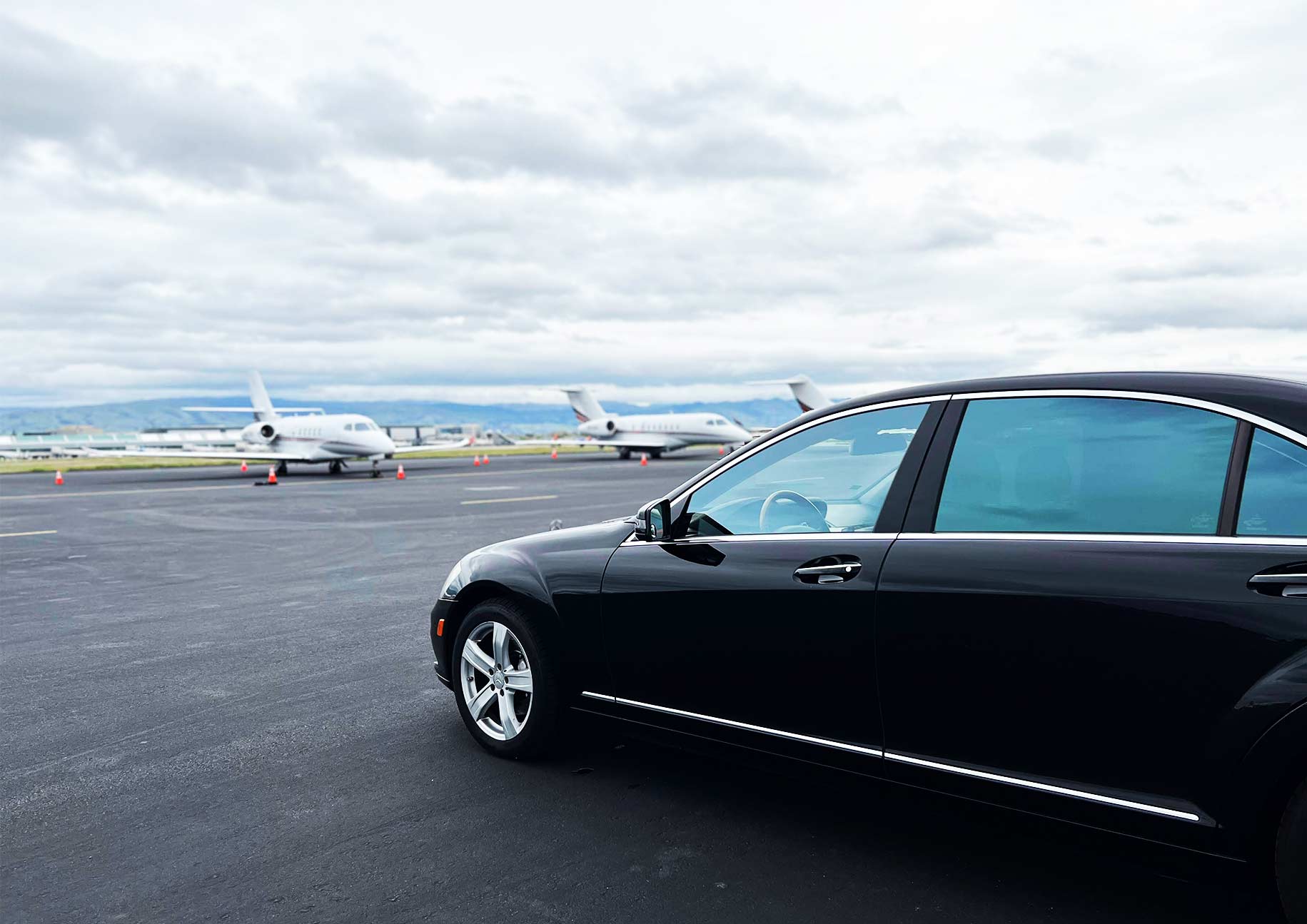 Executive black sedan for JFK Airport to Newark car service