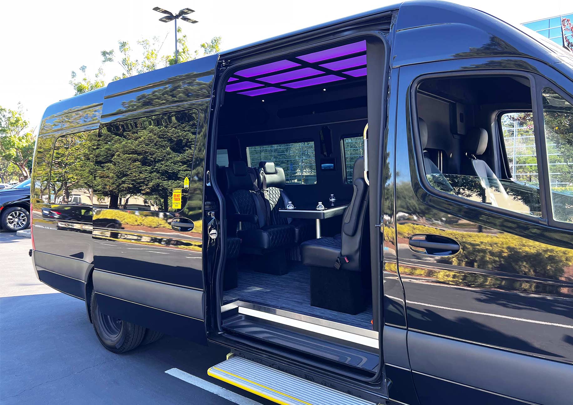 Passenger seating inside a Mercedes Sprinter for group transfers