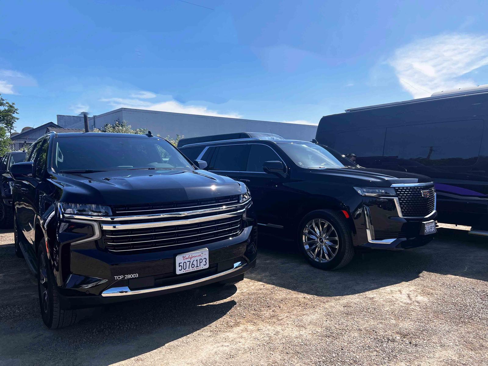 Black luxury SUVs parked side by side in San Francisco, offering spacious and premium airport transfer service